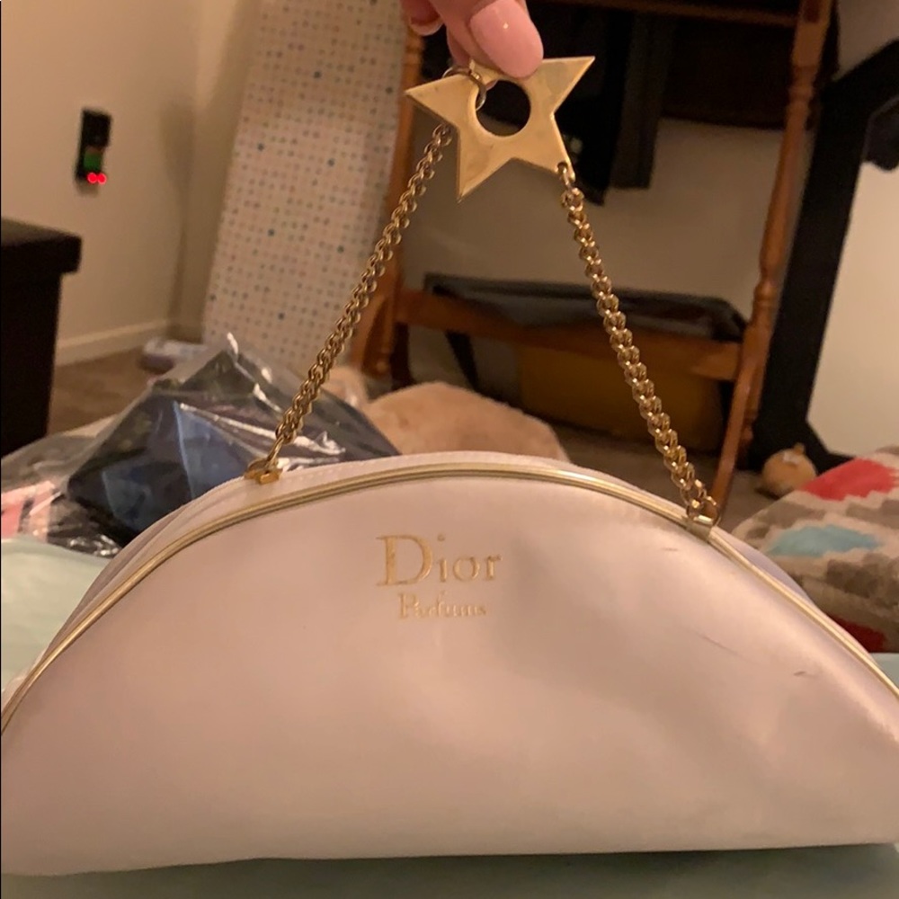White Dior makeup bag